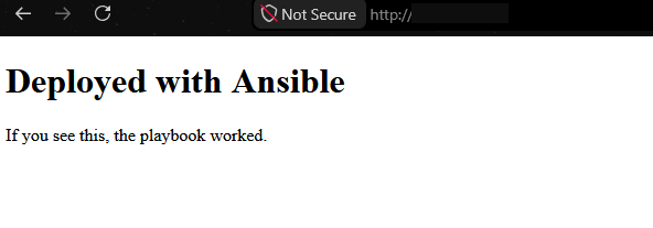 Browser window showing a plain page with the heading “Deployed with Ansible” and the text “If you see this, the playbook worked.”